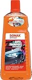SONAX AutoShampoo Konzentrat (2 Liter) durchdringt und löst Schmutz gründlich, ohne Angreifen der Wachs-Schutzschicht | Art-Nr. 03145410, Orange