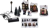 Spetebo Weihnachtsdorf mit LED Beleuchtung - 10 Teile - Winterdorf beleuchtet und Batterie betrieben - Weihnachtsstadt Tischdeko