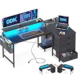 ODK Eckschreibtisch mit 4 Stoff Schubladen, Reversible Schreibtisch L Form mit 2 Steckdosen und 2 USB Ladeanschluss, Gaming Tisch L Form mit LED&Monitorständer für Home Office (Schwarz, 140x80x85.9cm)