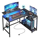 Bestier L-förmiger Gaming-Schreibtisch mit LED-Beleuchtung, Steckdosen, 2 Regalen und Haken, kompakter Eckschreibtisch, umkehrbarer Computertisch für Home Office, Schlafzimmer, kleine Räume 106,5 cm